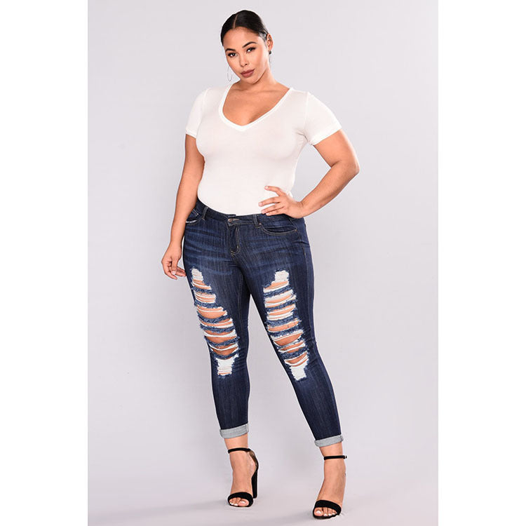 Plus size Ripped stretch jeans  Jeans Thecurvestory